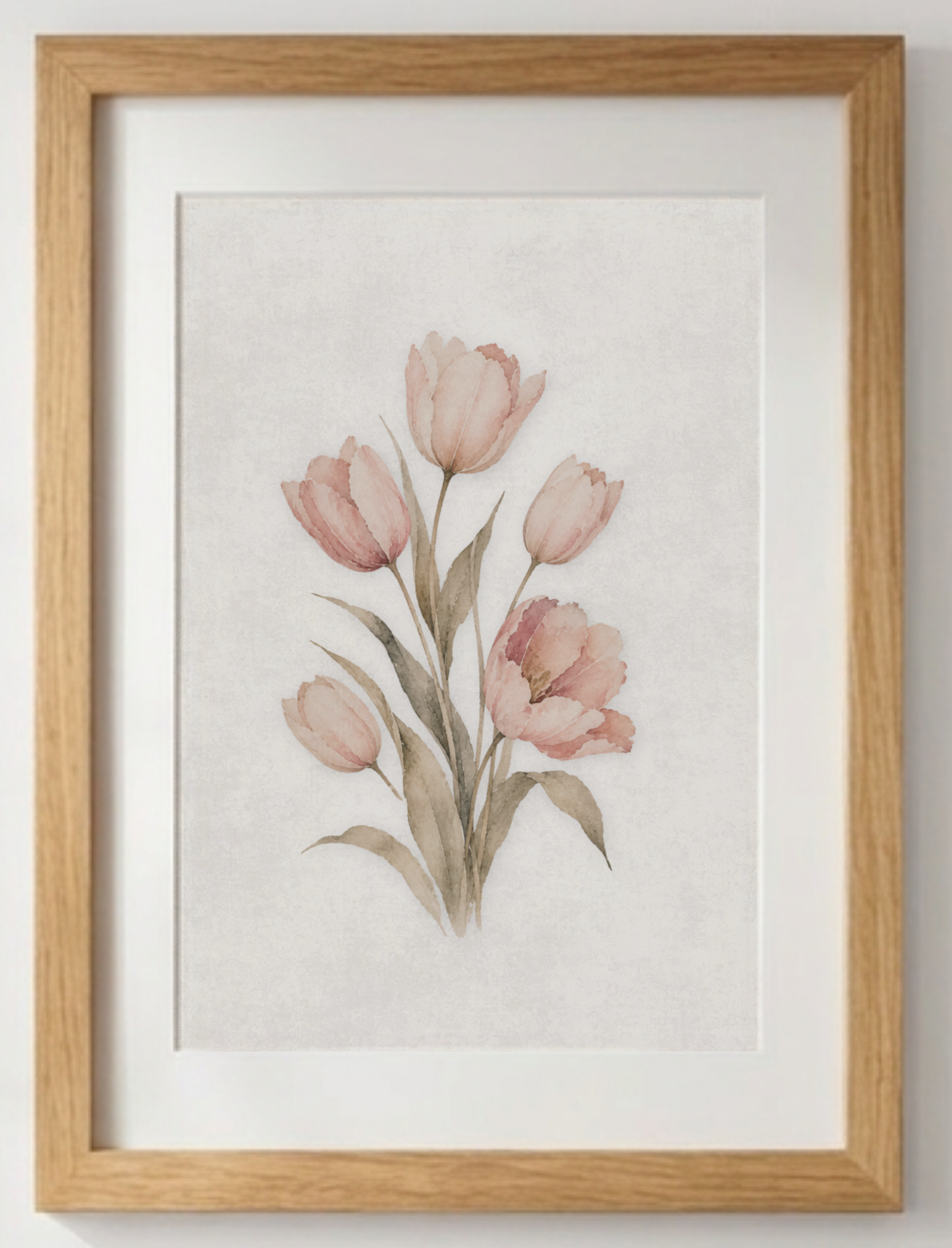 Close-up of Quiet Bloom botanical wall art in a natural oak frame, showcasing soft blush tulips and delicate watercolour textures.
